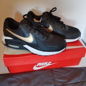 Nike Women's Black Sneakers with Gold Swoosh